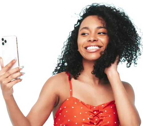 A girl holding phone in her hand taking a selfie